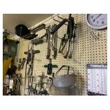 Contents of Peg Board: Clamps, Hoses, Tools