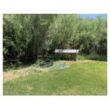 Corner of Side Back Yard: Metal Rack, Lightt Bulbs