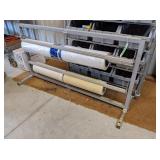 Tower Rack, Rolls of Plastic Sheet