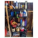 Shelf with Contents: Oil, Cleaners, Buckets,