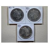 2) 1921-D and 1) 1921 Morgan Silver Dollars