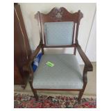 Ornate Cushioned Wooden Armchair