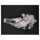 Painted Skull with Decorative Beads and Feathers