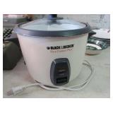 Assorted Plates, Bowls, and Rice Cooker