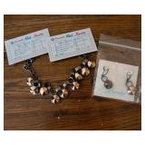 Necklace, Earrings, Reel Tickets