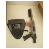 Airsoft Gun And Mask.