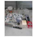 Glasses, Mini Football Mugs, Knife, Grizzly Cards.