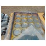 Stack of Aluminum Bun/Cookie Pans