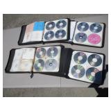 (4) Binders Of Assorted Music CDs