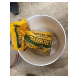2 1/2 gal bucket with partial 10 lb bag of mortar