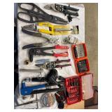 Tray of metal cutting shears, rivet tools, punch