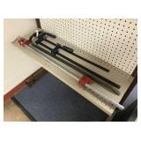 Three clamps and a tire iron Three clamps and a tire iron
