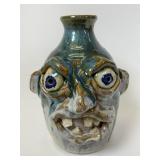Signed Folk Pottery Face jug
