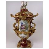 Ornate hand painted porcelain lidded urn
