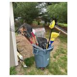 Yard Tools in 44 Gallon Trash Can