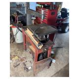 Electric Jigsaw on Wooden Stand