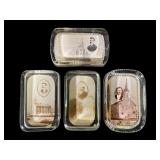 Five Souvenir Glass Paperweights