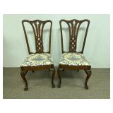 Pair of oak chairs with paw feet, poster seats