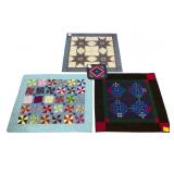 Assortment of Four Hand-Quilted Textiles