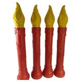 A Set of Four Empire Plastic Blow Mold Candles