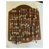 Souvenir Spoon Collection on Pineapple Wood Rack
