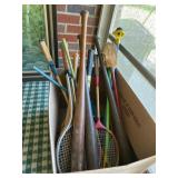 Assortment of Vintage Wooden Bats and Rackets