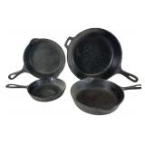 Group of Cast Iron Skillets and Pans