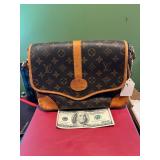LV.