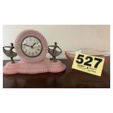 Pink clock and glass