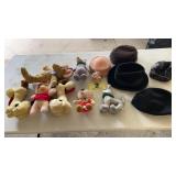 Stuffed animals and hats