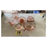 Assorted pink glass