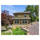 Charming 4 Bedroom Home on 0.54 Acres with Finished Attic and Walk Out Basement