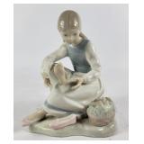 Lladro 'Girl Putting On Shoeï¿½ Porcelain Sculpture