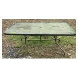GLASS TOP TABLE -LEANS-LEG BENT