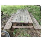 WOODEN PICNIC TABLE WITH ATTACHED BENCHES