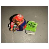 MONKEY ON A TRICYCLE TIN TOY