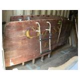 BACK END OF A WOODEN BOAT