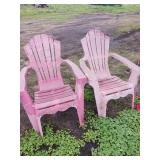 Two Pink Plastic Chairs