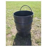 Black Plastic Barrel With Contents