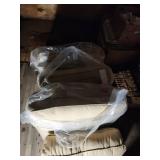 Four Beige Upholstered Cushions