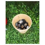 Bucket of Used Electrical Outlet Covers