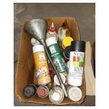 Shelf of Auto Paint, Spray Oils, and Accessories