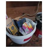 Plastic Bowl of Light Bulbs and Coffee Can Casters