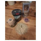 Decorative Tins, Ceramic Teapot, and Wall Clock