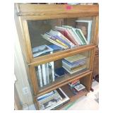 Three-Shelf Glass Front Cabinet with Books