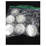 6x bidSilver Bullion Coins in Plastic Sleeves