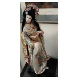 Vintage Geisha Doll Holding Samurai Helmet on Base