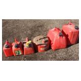 (5) Plastic Fuel Cans, 1 Metal Can