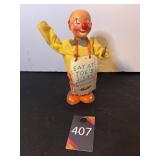 Vintage Metal Wind Up Clown Toy "Eat at Joe
