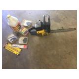 Chainsaw With Chains and Oil